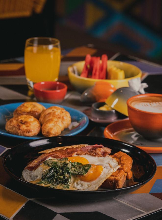 Hotel V1501 Pasto Exterior foto A typical breakfast in the Dominican Republic