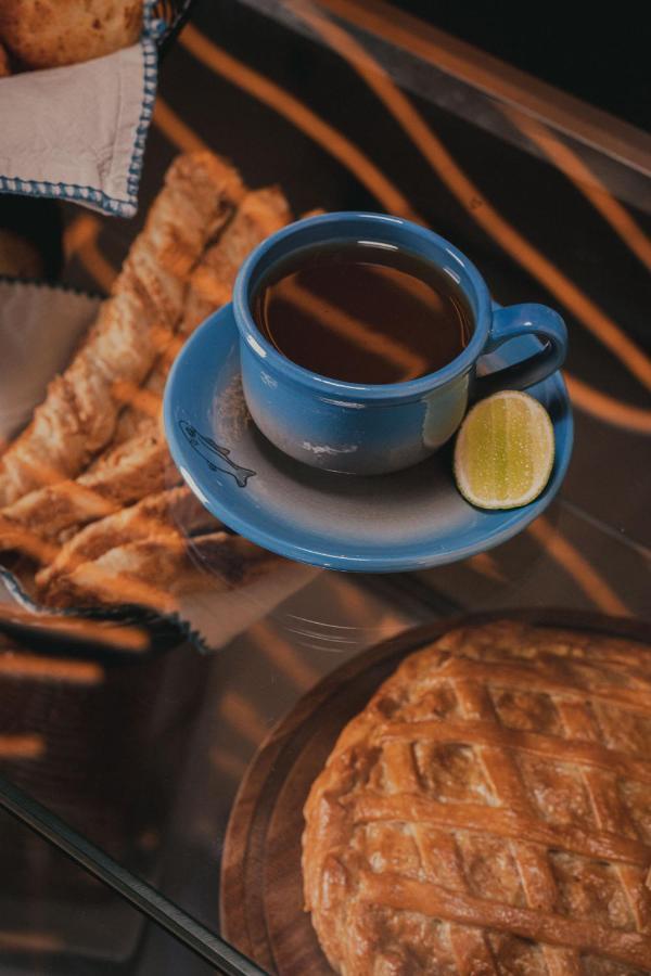 Hotel V1501 Pasto Exterior foto A cup of coffee with a slice of lime